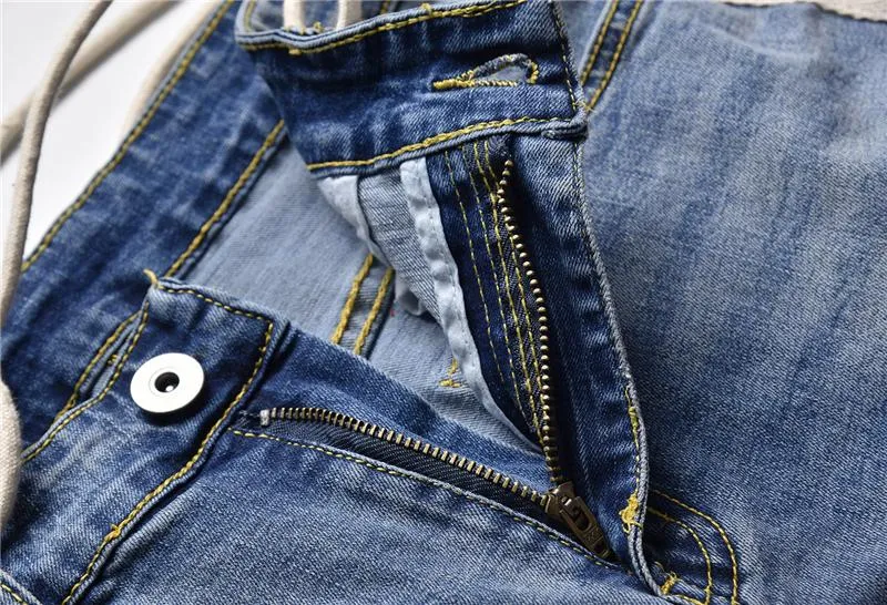 Distressed Knee Ripped Side Stripe Ankle Zipper Jeans